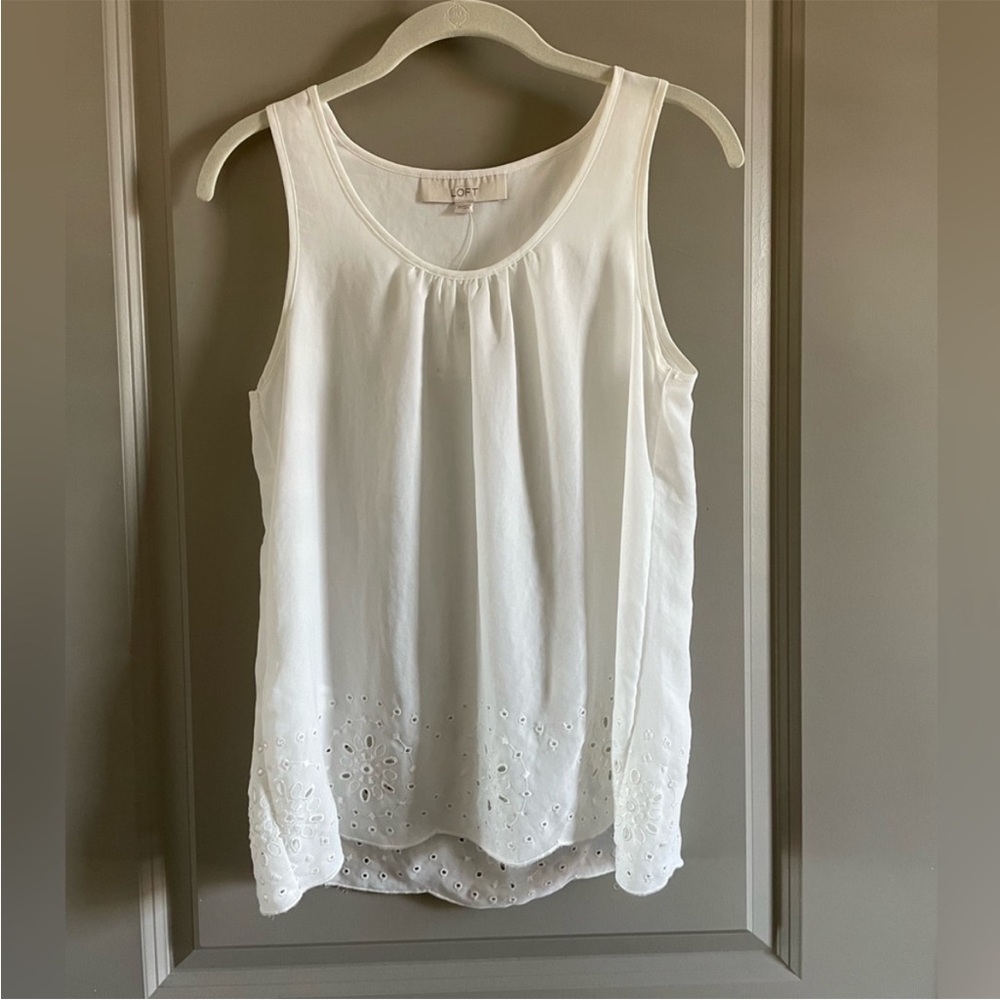 LOFT white eyelet tank top. 100% polyester. A bit sheer. Never worn.